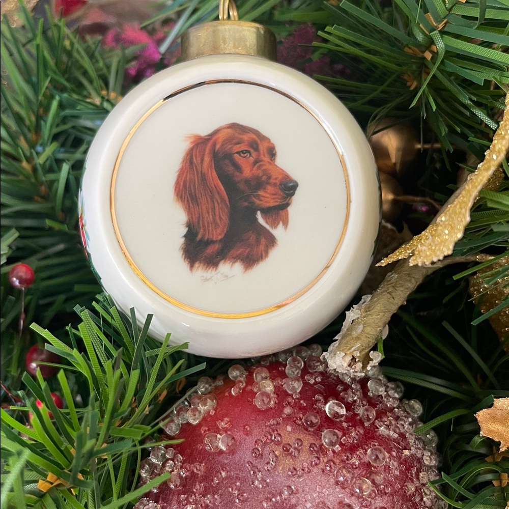 Porcelain Christmas ornament with Irish Setter by artist Robert J May